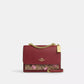 Klare Crossbody Bag In Signature Canvas With Cherry Print