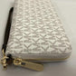 Michael Kors Jet Set Travel ivory Signature PVC Continental Wallet Wristlet