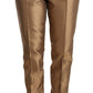 Dolce & Gabbana Elegant Tapered Silk Trousers in Gold