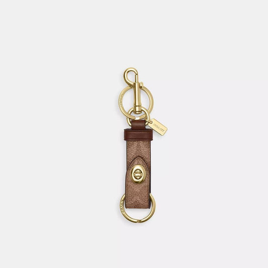 Coach Outlet Trigger Snap Bag Charm In Signature Canvas