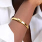 Gold-Tone Polished Heart Bangle Bracelet