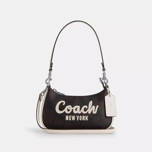 Teri Mini Crossbody Bag In Signature Canvas With Coach Graphic