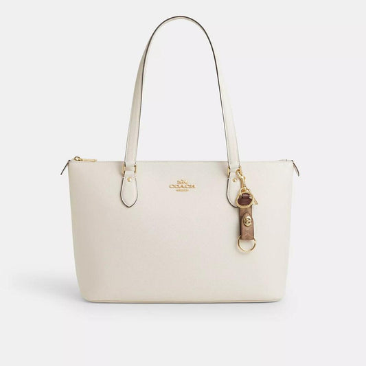 Coach Outlet Trigger Snap Bag Charm In Signature Canvas