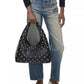 The Glam Studs Leather Sack Bag