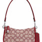 The Coach Originals Signature Jacquard Swinger 20 Shoulder Bag