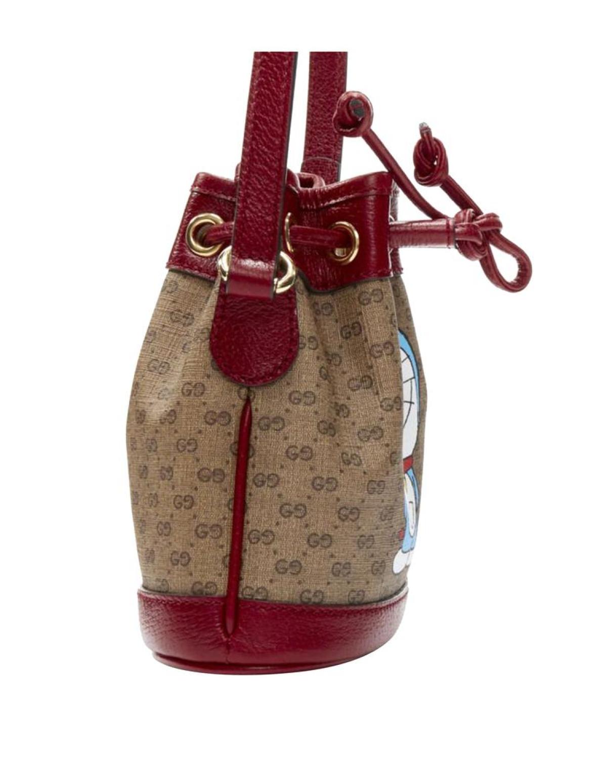 new GUCCI DORAEMON 2021 Limited GG Supreme red drawstring crossbody bucket bag