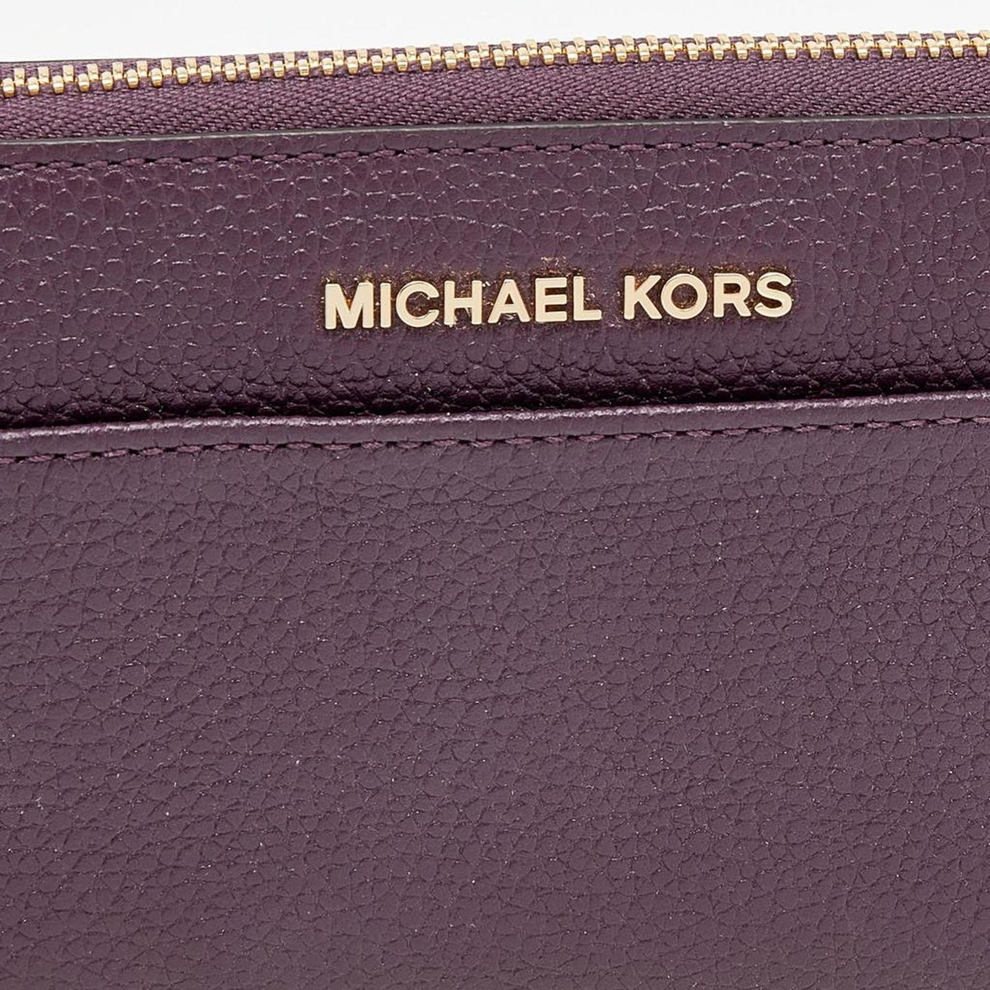 Michael Kors Plum Leather Mercer Zip Around Wallet..