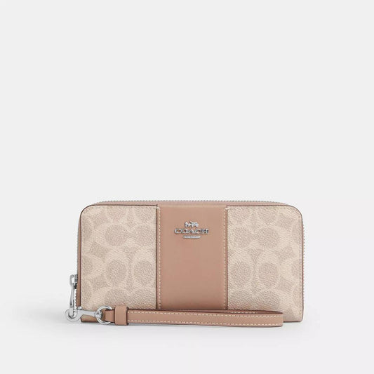 Coach Outlet Long Zip Around Wallet In Signature Canvas With Stripe