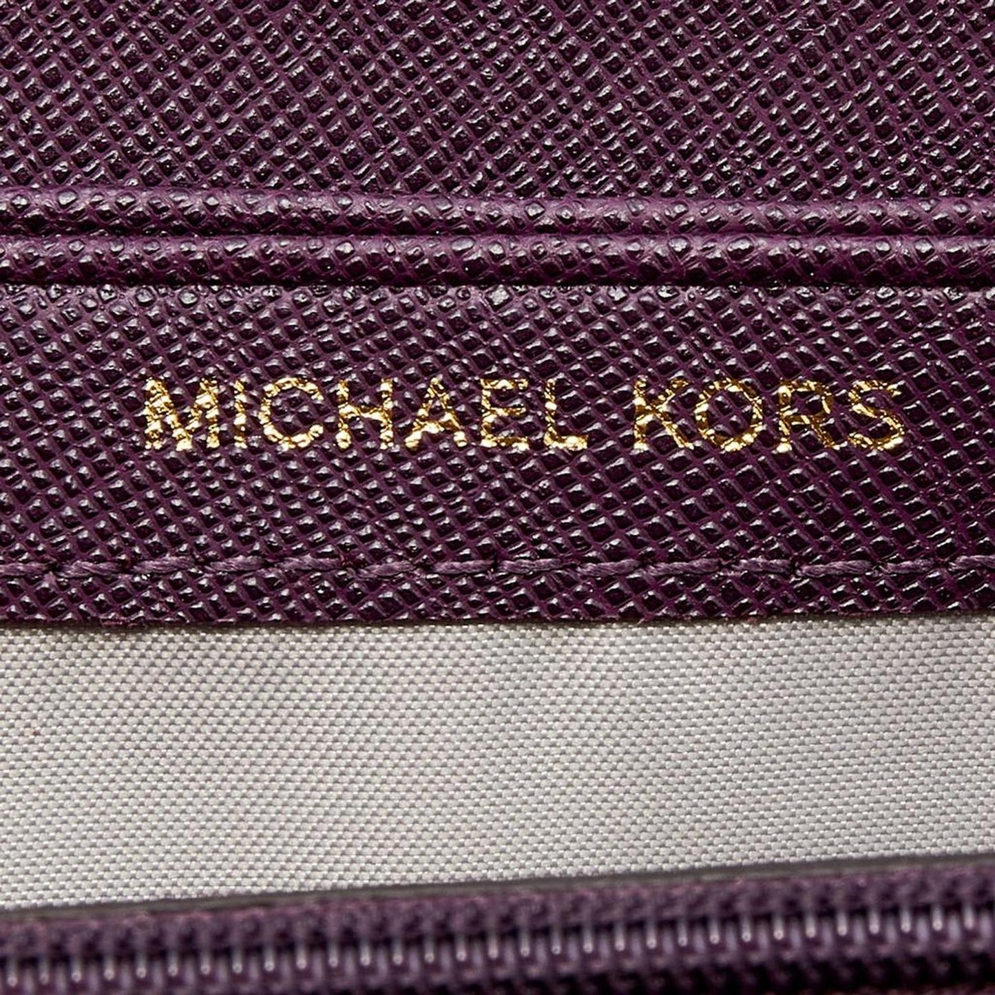 Michael Kors Plum Leather Mercer Zip Around Wallet..