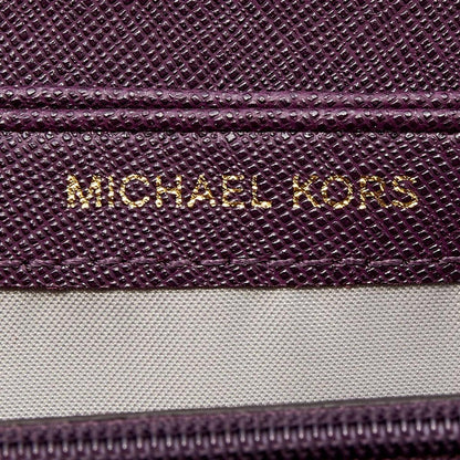 Michael Kors Plum Leather Mercer Zip Around Wallet..