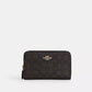 Coach Outlet Medium Id Zip Wallet In Signature Canvas