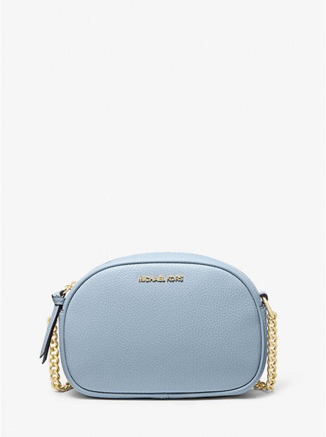 Jet Set Small Oval Crossbody Bag