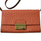 Michael Kors Embossed Ostrich Skin Clutch Bag in Orange Leather