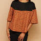 Celeste Top - Jungle Dot In Orange And Black