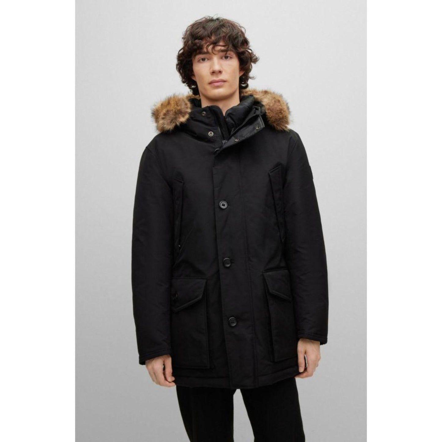 Water-repellent down jacket with faux-fur trimmed hood