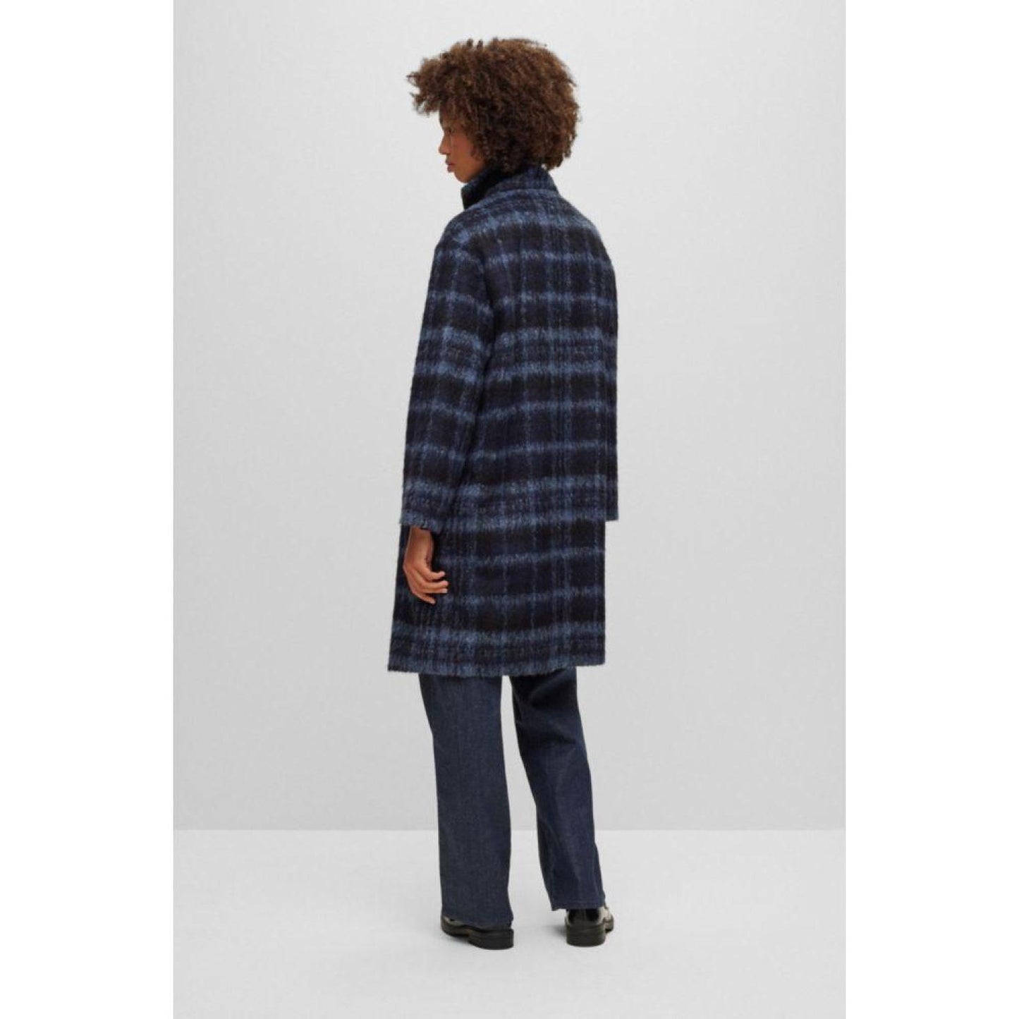 Oversize-fit checked coat with turn-lock closures