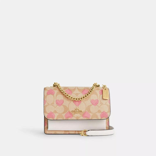 Coach Outlet Mini Klare Crossbody In Signature Canvas With Heart Print