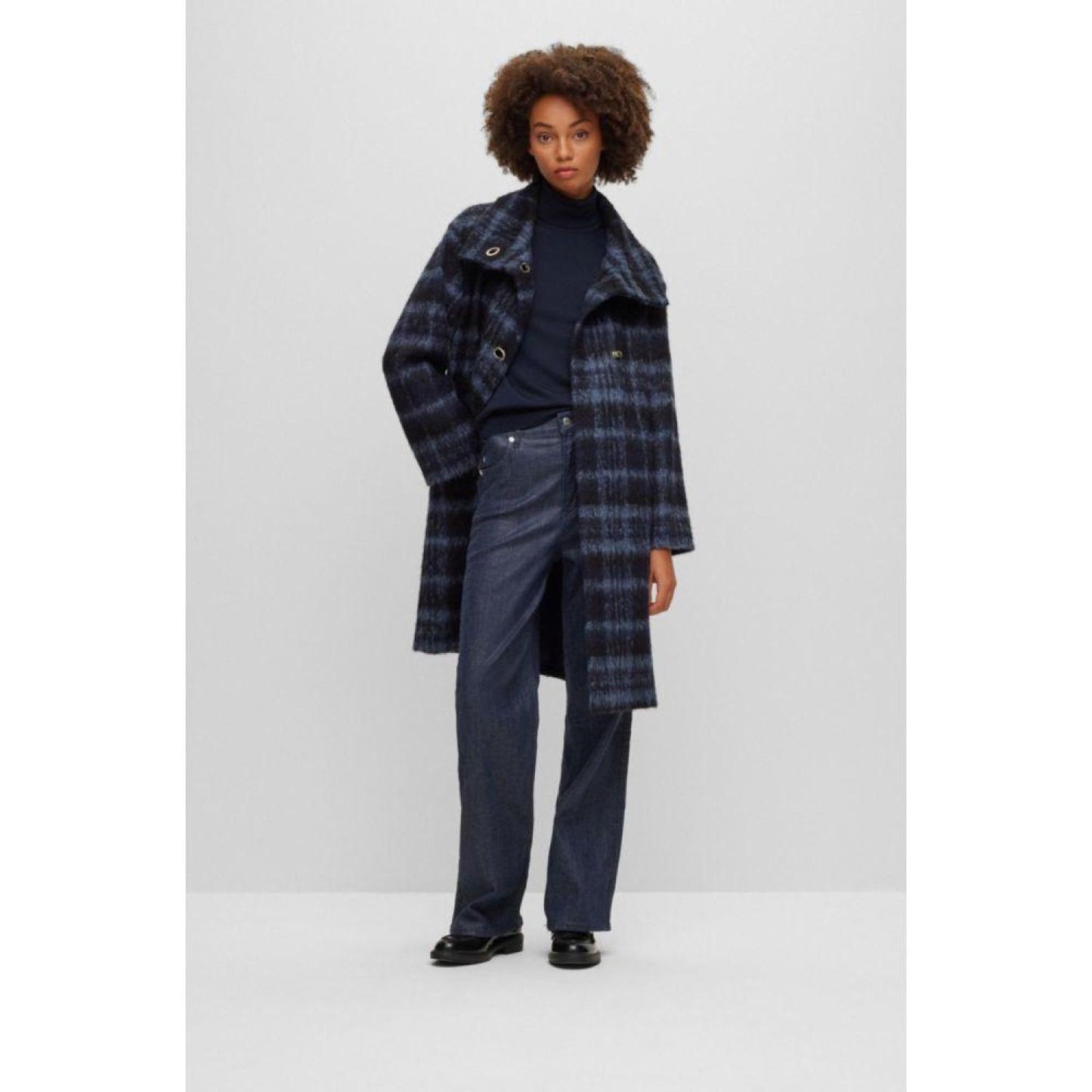 Oversize-fit checked coat with turn-lock closures