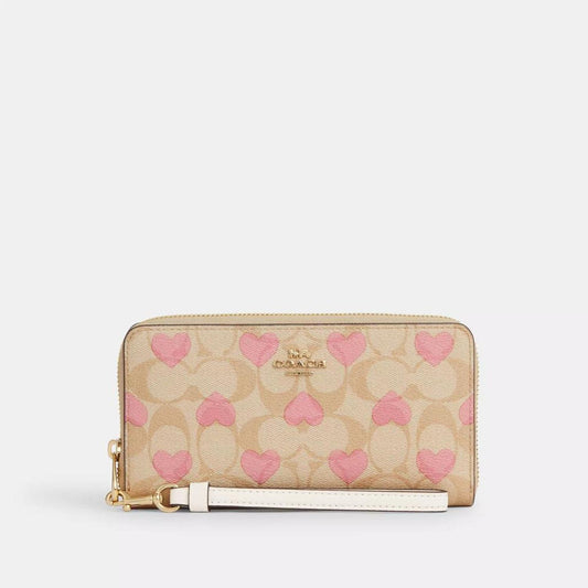 Coach Outlet Long Zip Around Wallet In Signature Canvas With Heart Print