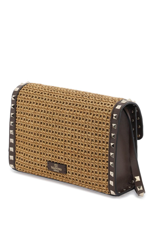 Valentino garavani raffia rockstud small crossbody bag