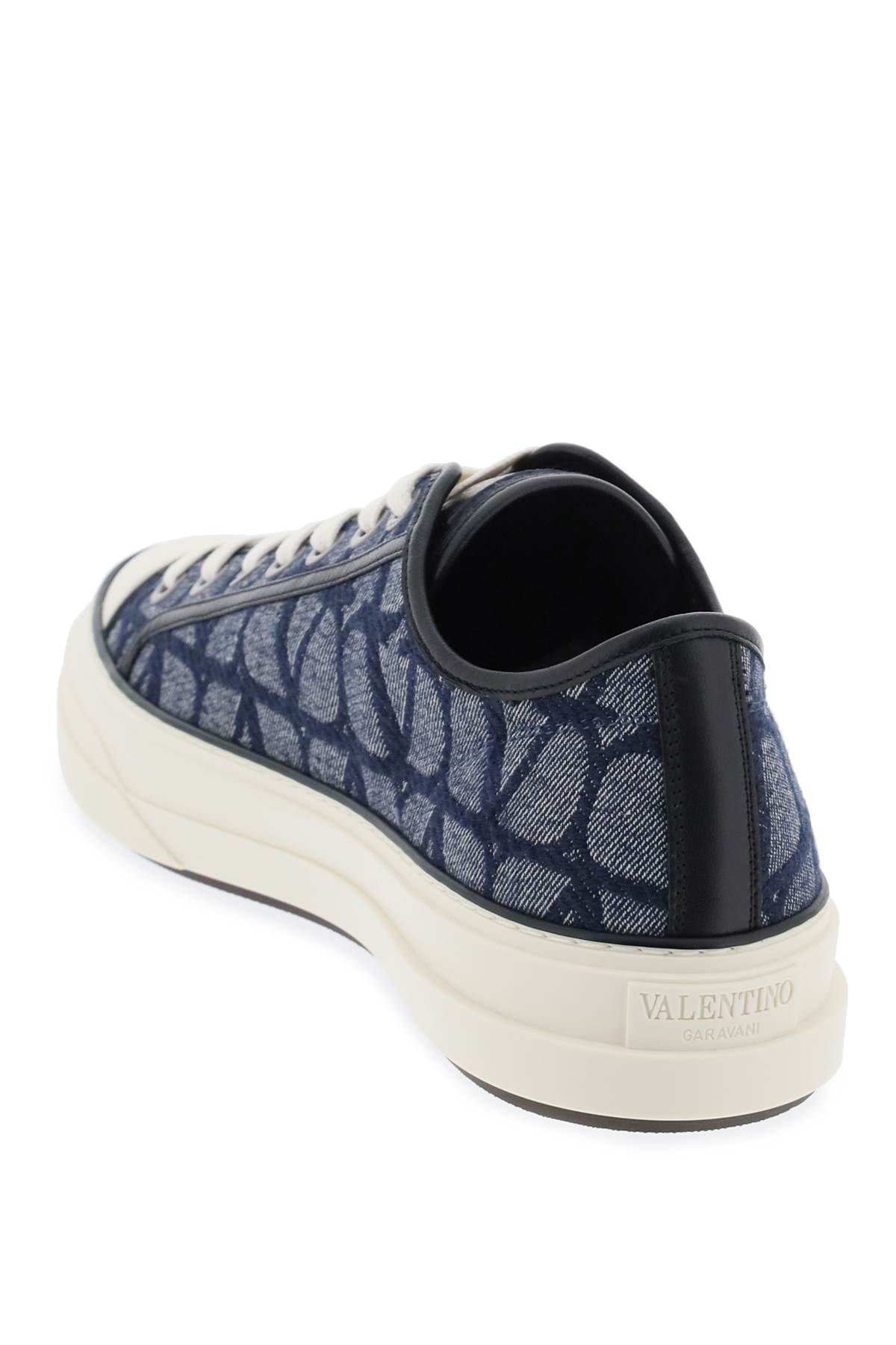 Valentino garavani totaloop low-top sneakers in denim-effect toile iconographe