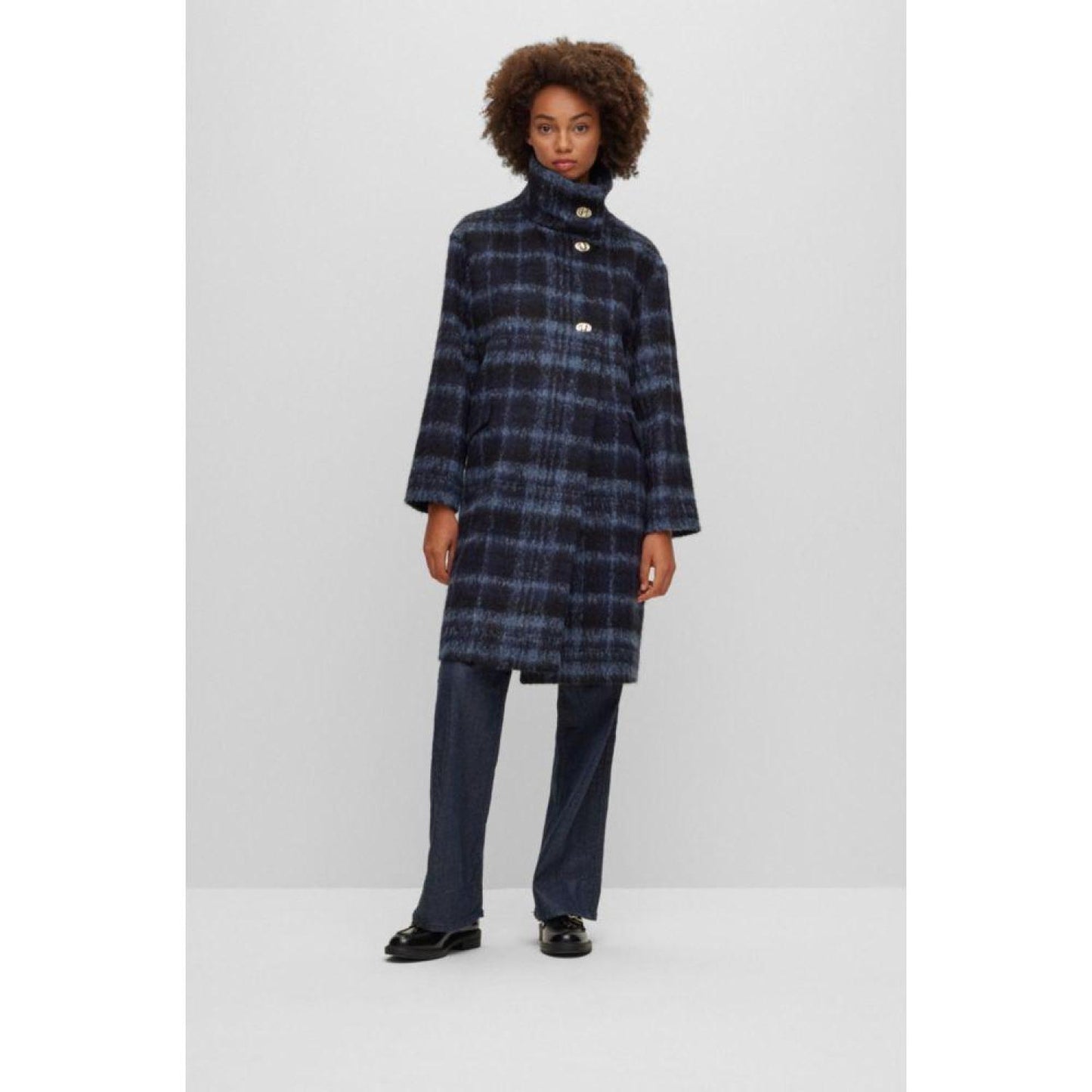 Oversize-fit checked coat with turn-lock closures