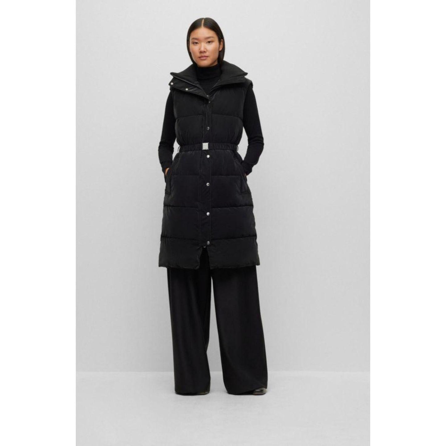 Long-length puffer gilet with buckled belt