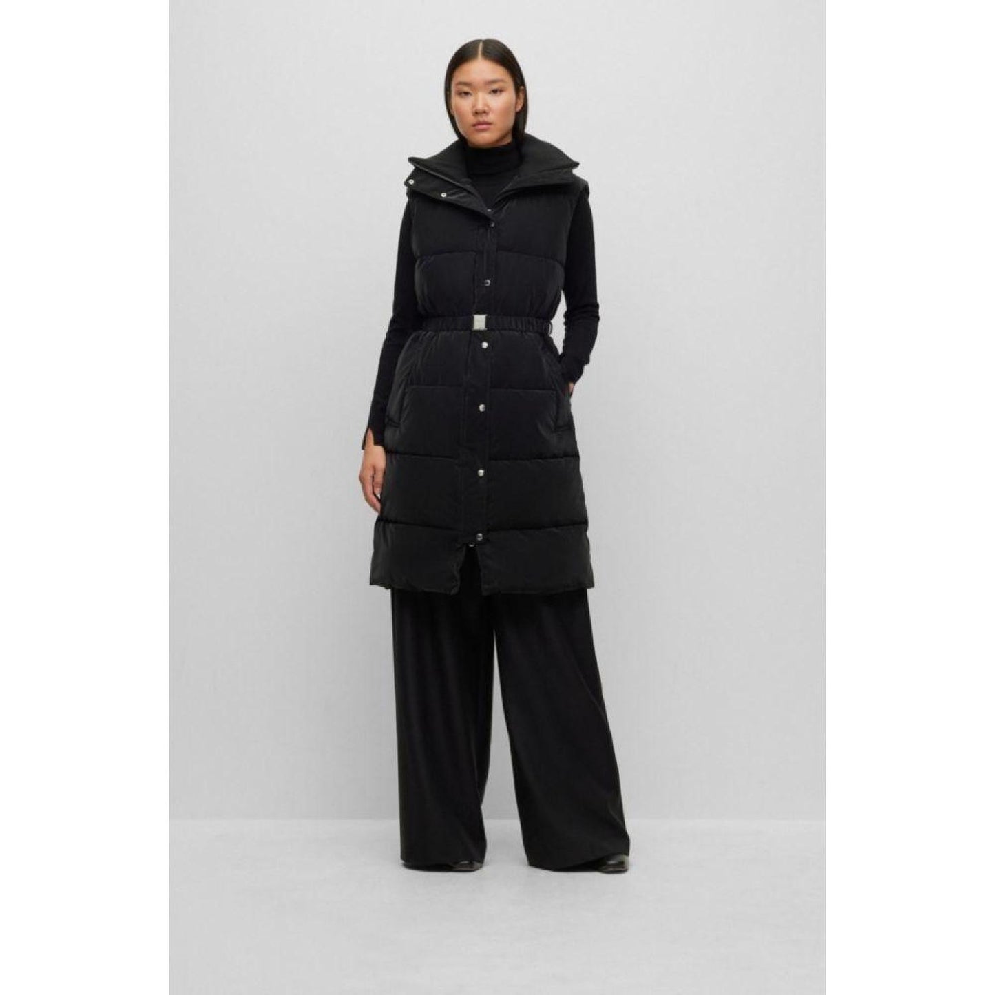 Long-length puffer gilet with buckled belt