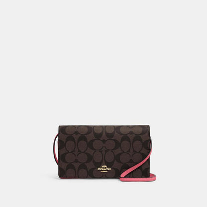 Coach Outlet Anna Foldover Crossbody Clutch In Signature Canvas