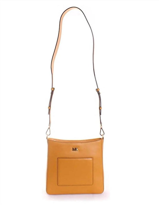 Gloria Pocket Swing Pack Crossbody In Marigold