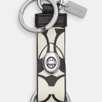 Coach Outlet Trigger Snap Bag Charm In Signature Canvas