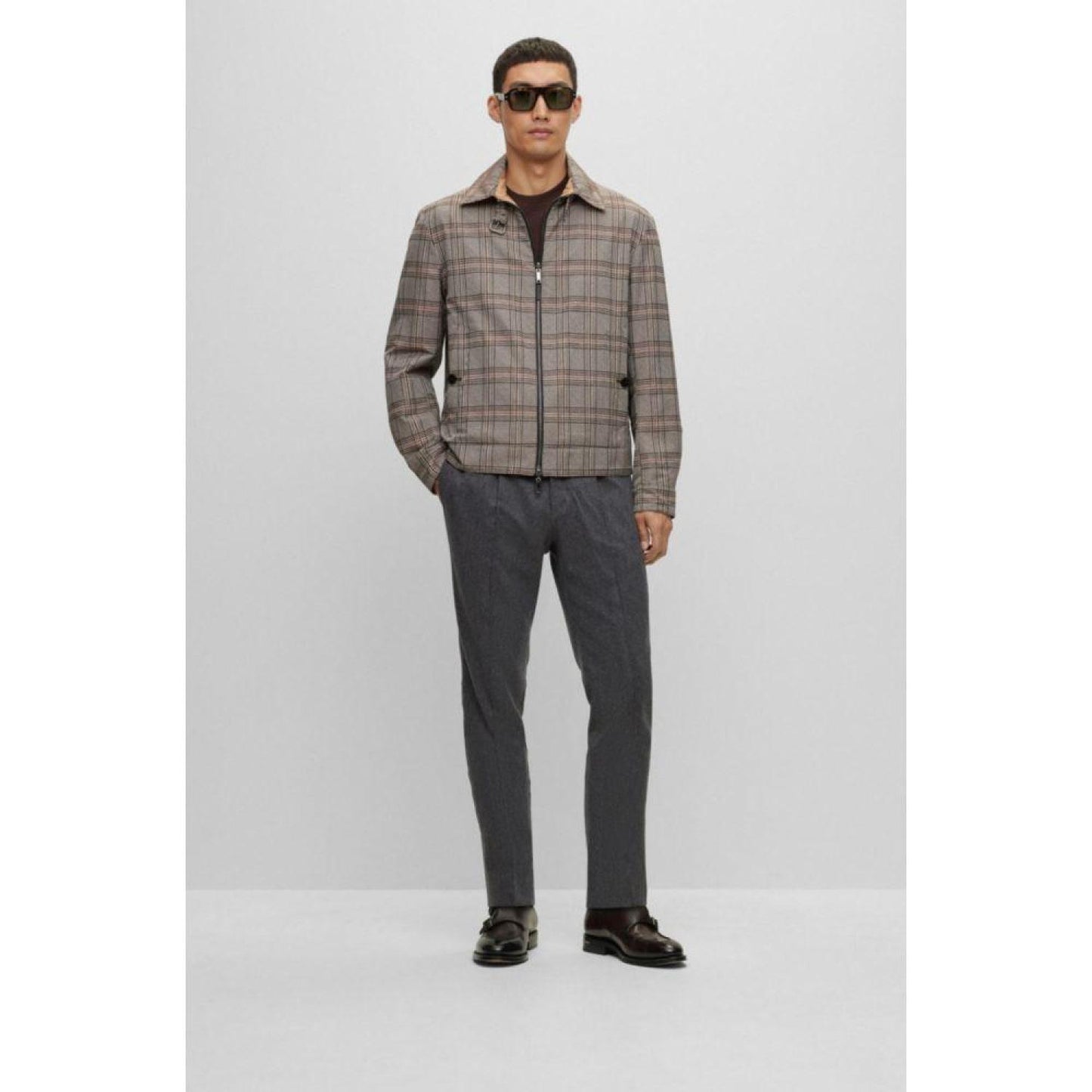 Water-repellent reversible blouson-style jacket with check pattern