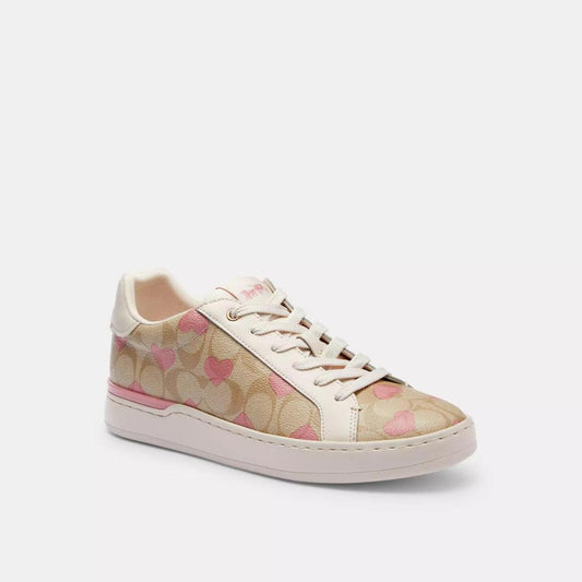 Coach Outlet Clip Low Top Sneaker In Signature Canvas With Hearts