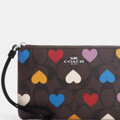 Coach Outlet Corner Zip Wristlet In Signature Canvas With Heart Print