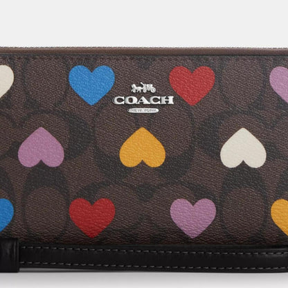 Coach Outlet Long Zip Around Wallet In Signature Canvas With Heart Print