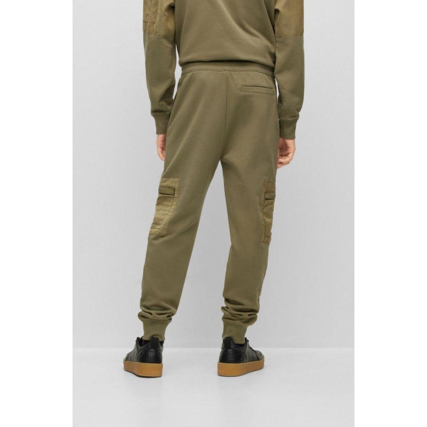 Relaxed-fit tracksuit bottoms with cargo pockets