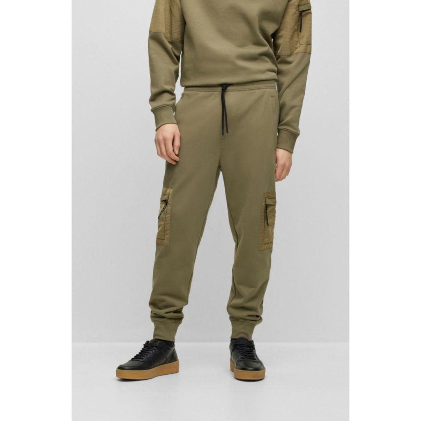 Relaxed-fit tracksuit bottoms with cargo pockets